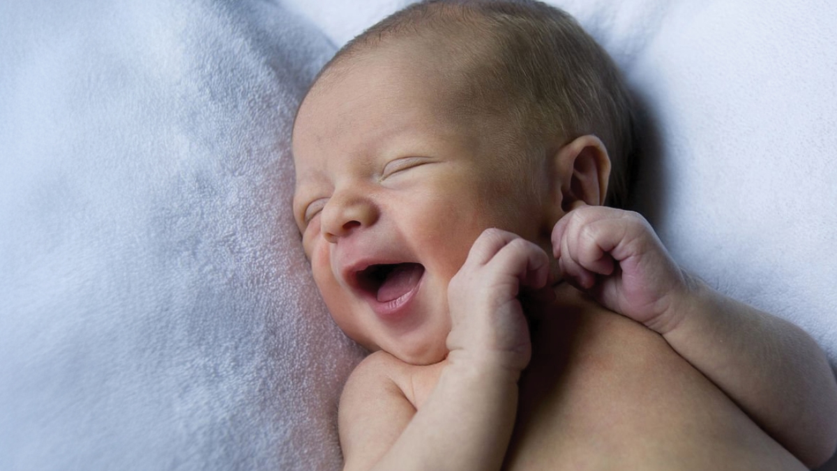 laughing newborn