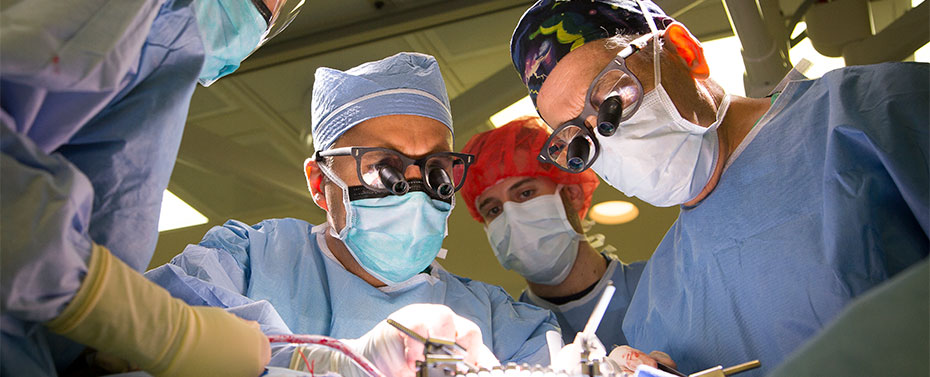 Team performing vascular surgery